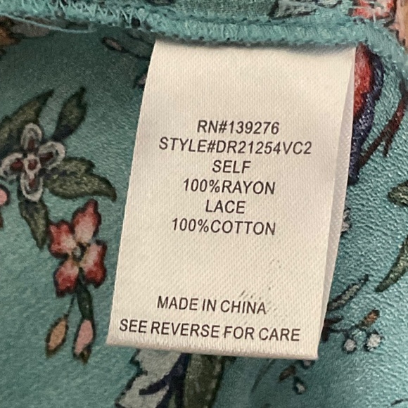 DR2  Size Small Greenish color with a floral print, Button up blouse. - Picture 3 of 4